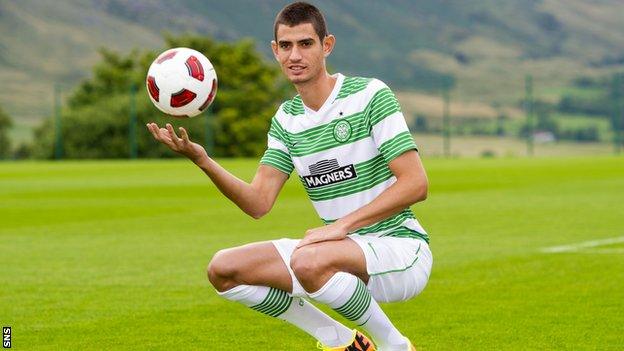 Israel midfielder Nir Biton poses in his new Celtic kit