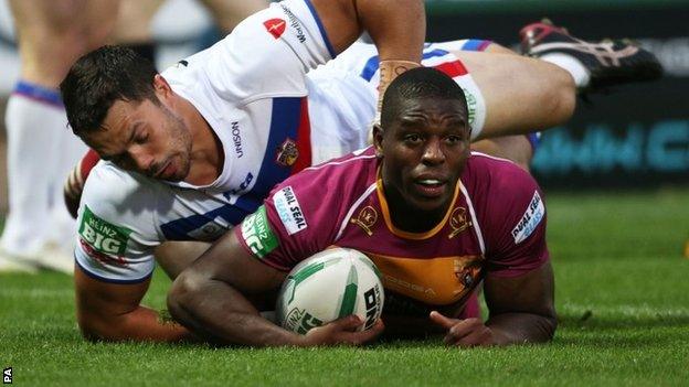 Huddersfield Giants Jermaine McGillvary scores a try