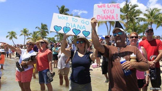 Supporters of Diana Nyad watch her complete her swim in Key West, Florida on 2 September 2013