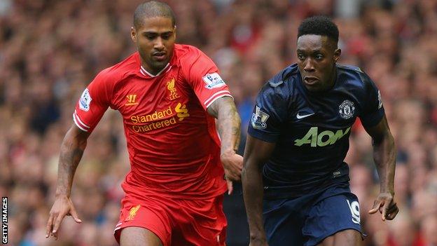 Glen Johnson (left) battles with Danny Welbeck