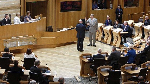 Cameron Buchanan being sworn in at the Scottish Parliament