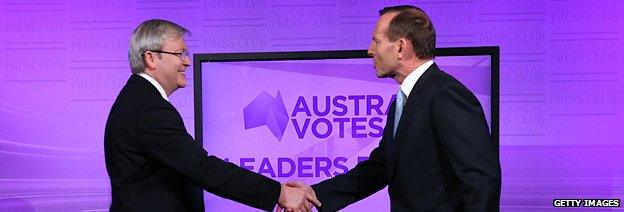 The two leaders of the main parties shake hands at the first debate