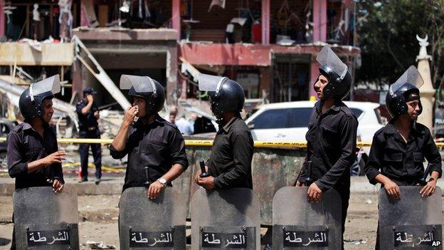 Security guards at scene of bomb attack in Nasr City, Cairo, on 5 September 2013