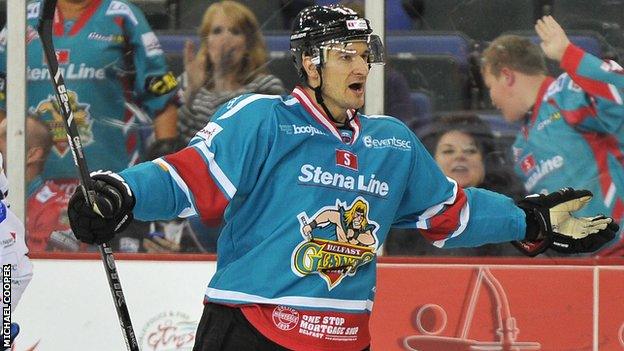 Jeff Szwez celebrates scoring against Edinburgh