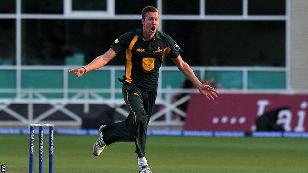 Notts bowler Jake Ball celebrates a wicket