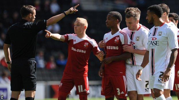 Nathan Byrne is sent off against MK Dons