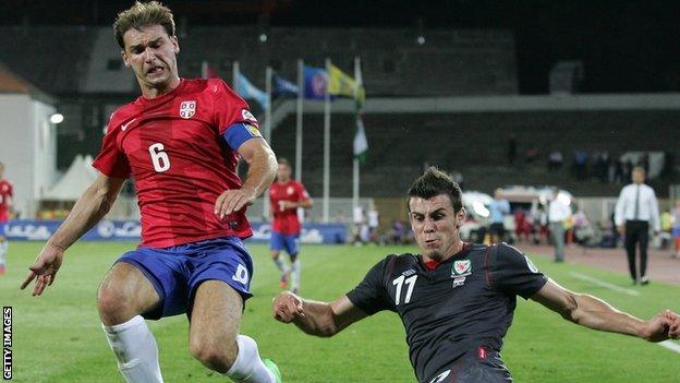 Branislav Ivanovic takes on Gareth Bale as Wales lost 6-1 in September 2012