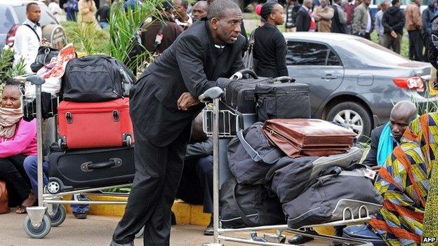 Travellers disrupted by the fire at Nairobi's international airport - August 2013