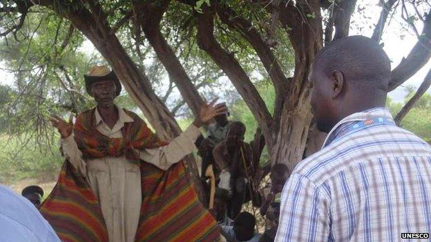 A Turkana elder delivering his views before commencement of the drilling exercise, Kenya