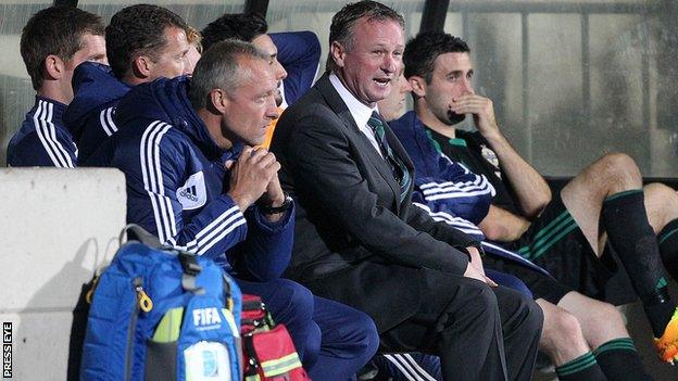 Michael O'Neill in the dugout during the Luxembourg defeat