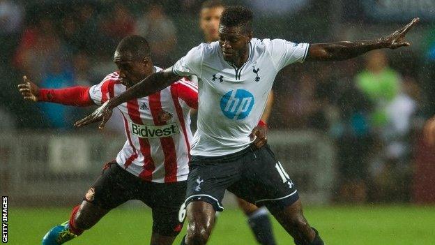 Cabral of Sunderland (left) and Emmanuel Adebayor of Tottenham Hotspur