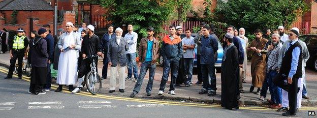 Community members in Asfordby Street, close to Wood Hill