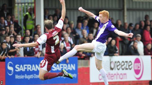 Dave Kitson beats Keith Lowe to the ball