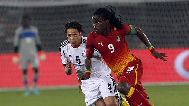 Egypt's Ibrahim Salah (left) fights for the ball against Ghana's Derek Boateng