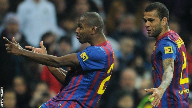 Eric Abidal and Dani Alves