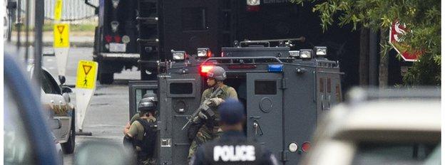 Police and military vehicles at the navy yard