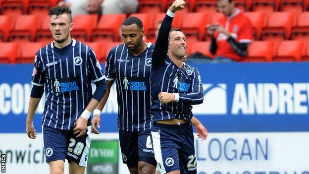 Scott McDonald celebrates putting Millwall ahead against Charlton