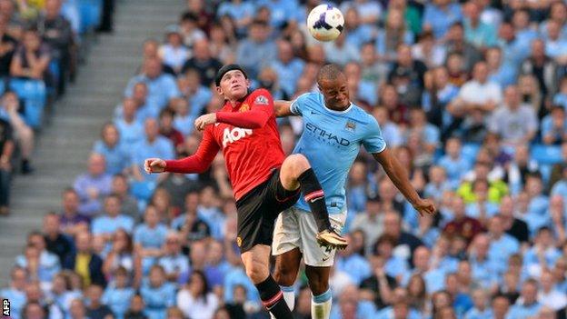 Wayne Rooney and Vincent Kompany