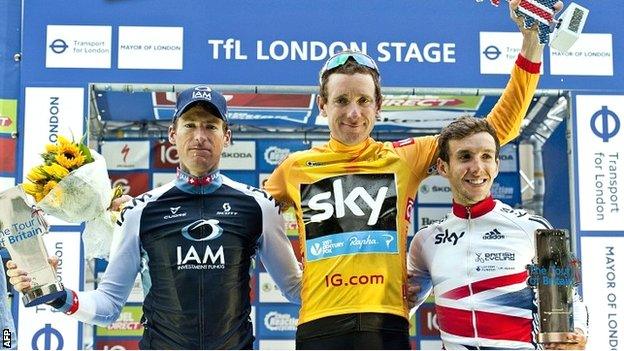 Sir Bradley Wiggins savours his Tour of Britain triumph with second placed Martin Elmiger (left) and Britain's Simon Yates (right) who was third