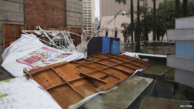 An advertisement board which was toppled over by Typhoon Usagi is pictured in Hong Kong, 23 September 2013