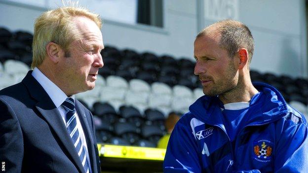 Kilmarnock chairman Michael Johnston (left) in conversation with manager Allan Johnston