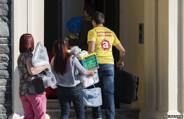 Students walking into halls of residence