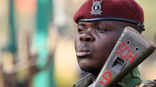 A Kenya General Service Unit policeman stands guard in the area around Westgate shopping mall in Nairobi, 25 September, 2013.