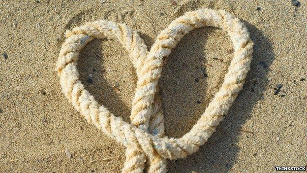 Rope heart on beach
