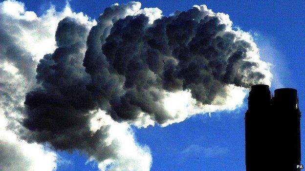 Smoke billowing from a power station