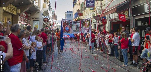 Gibraltar fans line street