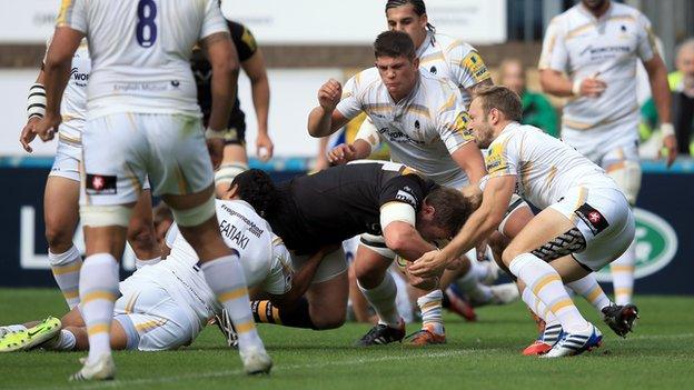 Wasps' Matt Mullan scores the game's first try against his old club Worcester