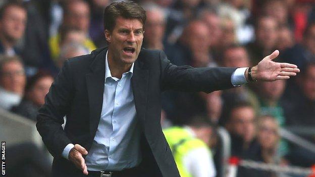 Swansea manager Michael Laudrup pleads with his team from the touchline at the Liberty Stadium