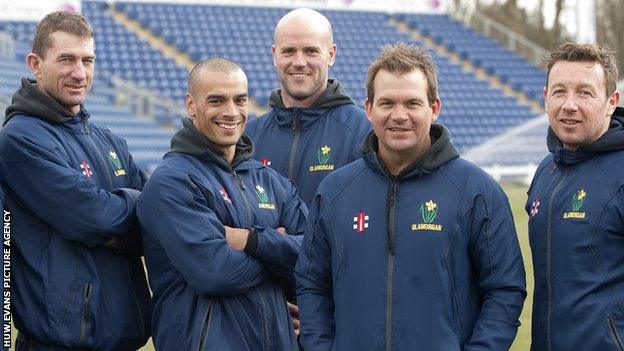 Steve Watkin (left) and Robert Croft (right) with Matthew Mott (second right)