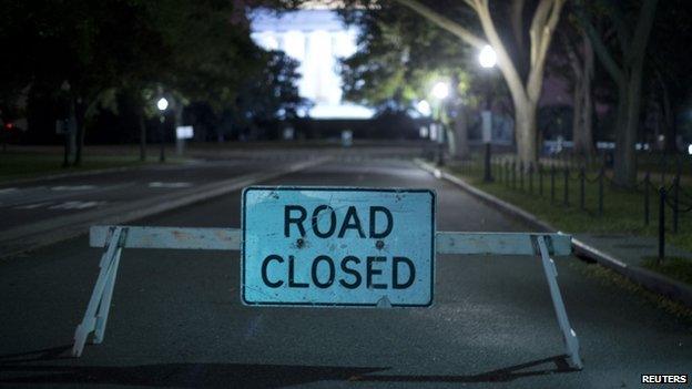 A barricade leading to the Lincoln Memorial prevents access to tourist buses in Washington on 1 October 2013.