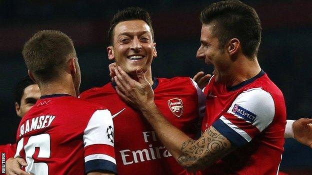 Mesut Ozil celebrates Arsenal's first goal