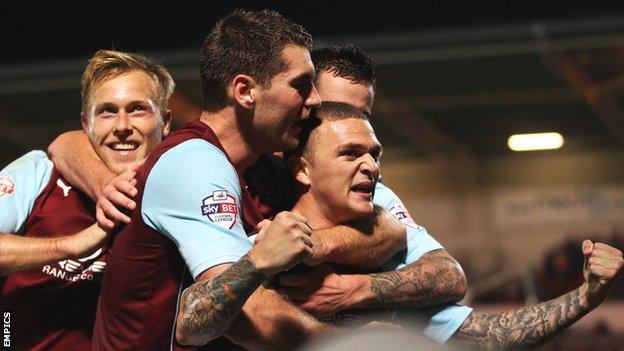 Kieran Trippier celebrates his second goal for Burnley at Doncaster