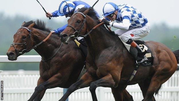 Al Kazeem on the right locked in battle with Mukhadram on the way to winning the Prince of Wales Stakes at Royal Ascot