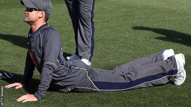 Australia captain Michael Clarke tests his back