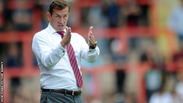 Justin Edinburgh on the sidelines with Newport County.