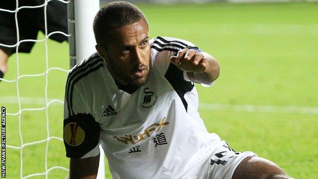 Wayne Routledge celebrates after scoring Swansea's goal