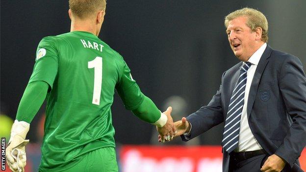 Roy Hodgson shakes Joe Hart's hand