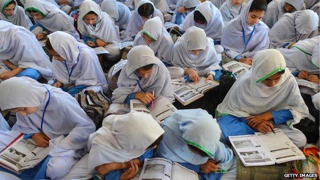 Girls attending class at a school in Mingora, Pakistan