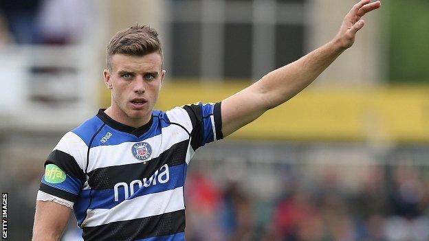 Bath fly-half George Ford raises his hand