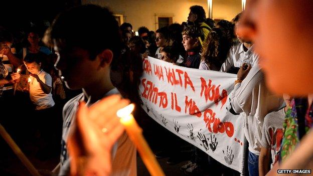 Torchlight procession through Lampedusa on 4 October 2013