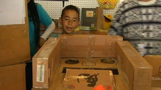 Caine Monroy with his cardboard arcade.