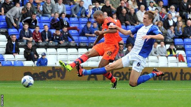 Bolton striker Jermaine Beckford (left) puts his side ahead against Birmingham