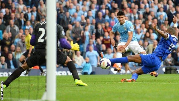 Sergio Aguero scores Manchester City's second goal against Everton