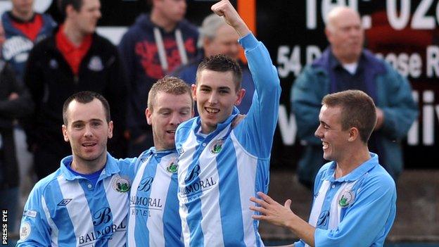 Daniel Hughes celebrates after putting Warrenpoint ahead