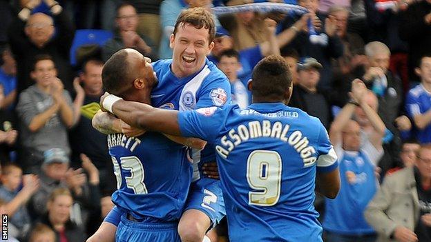 Tyrone Barnett (left) celebrates with team-mates