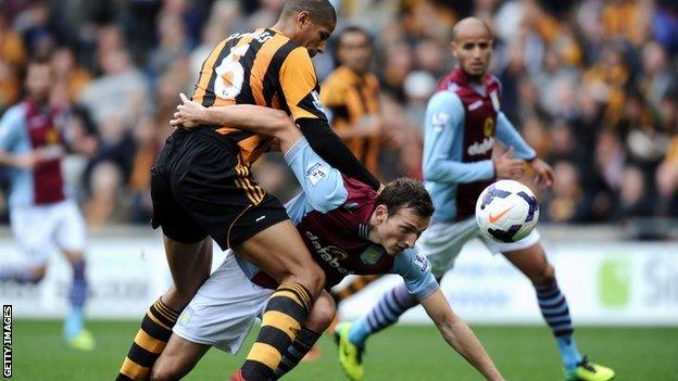 Libor Kozak contests the ball with Curtis Davies